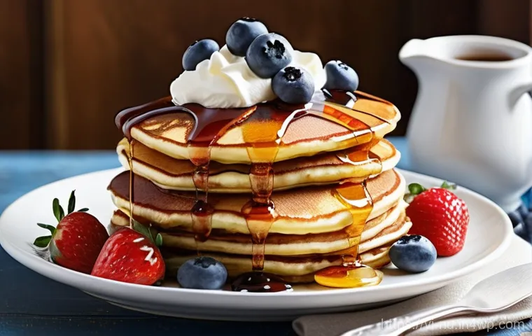 캐나다식 팬케이크 기본 레시피 - **Golden Fluffy Pancake Flip in a Cozy Kitchen**
    A close-up, dynamic shot of a perfectly golden-...